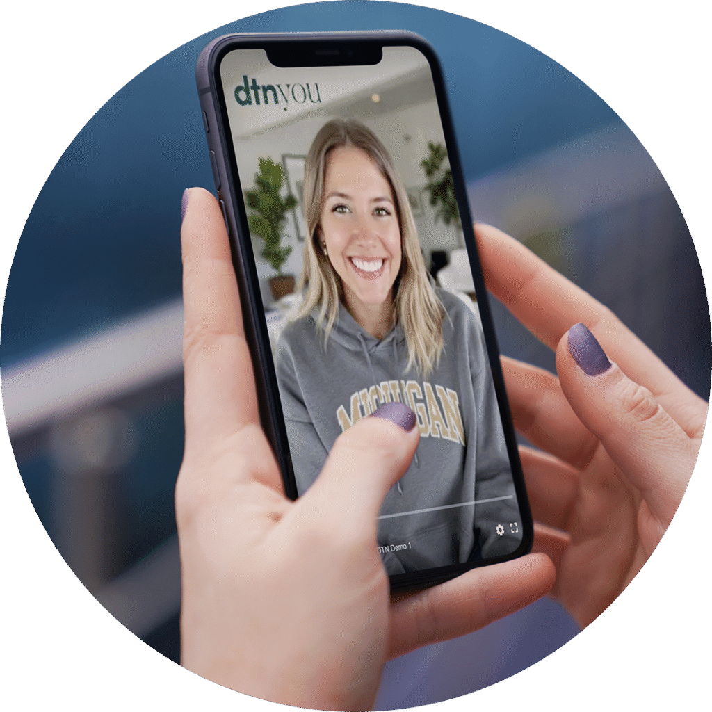 Hands holding phone showcasing spokesperson video ads