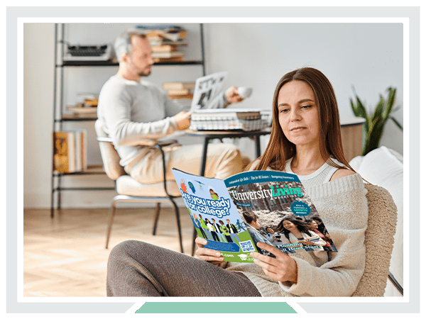Parents reading the latest edition of University living Magazine
