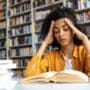 Female Student Studying in Library